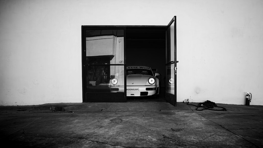 Car trunk open in a garage