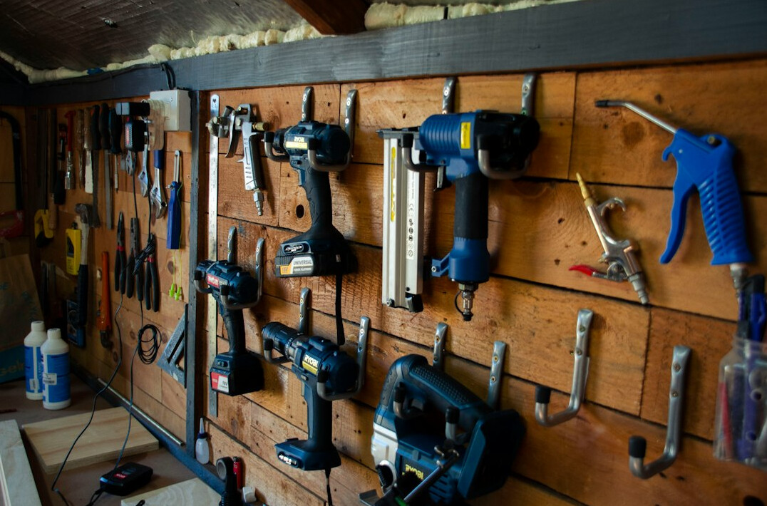 Hand tools hanging in a workshop